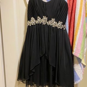 Worn once black semi formal dress with beautiful beading around the waist